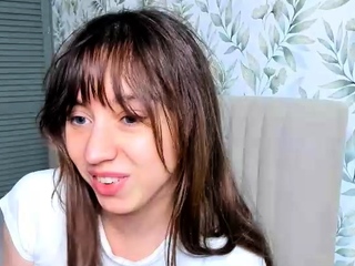 Cute curly brunette solo webcam masturbation